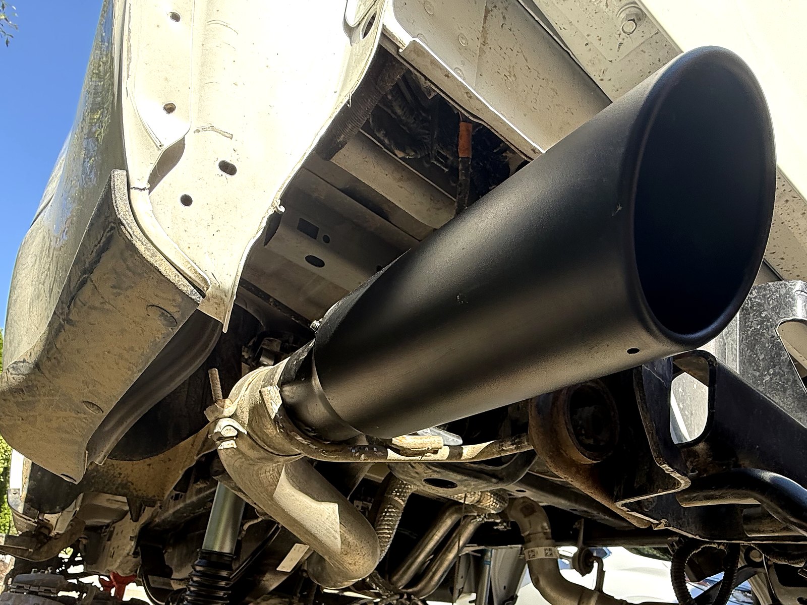 Vurkcy Bolt-on exhaust tip, 3 in inlet, 4 in outlet, 12 in long — On the truck.