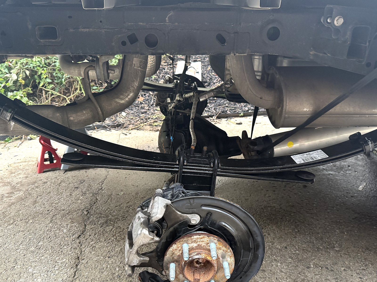 Ford OEM Stock-style replacement leaf springs — Hung on 3 Oct 2026, not yet torqued.