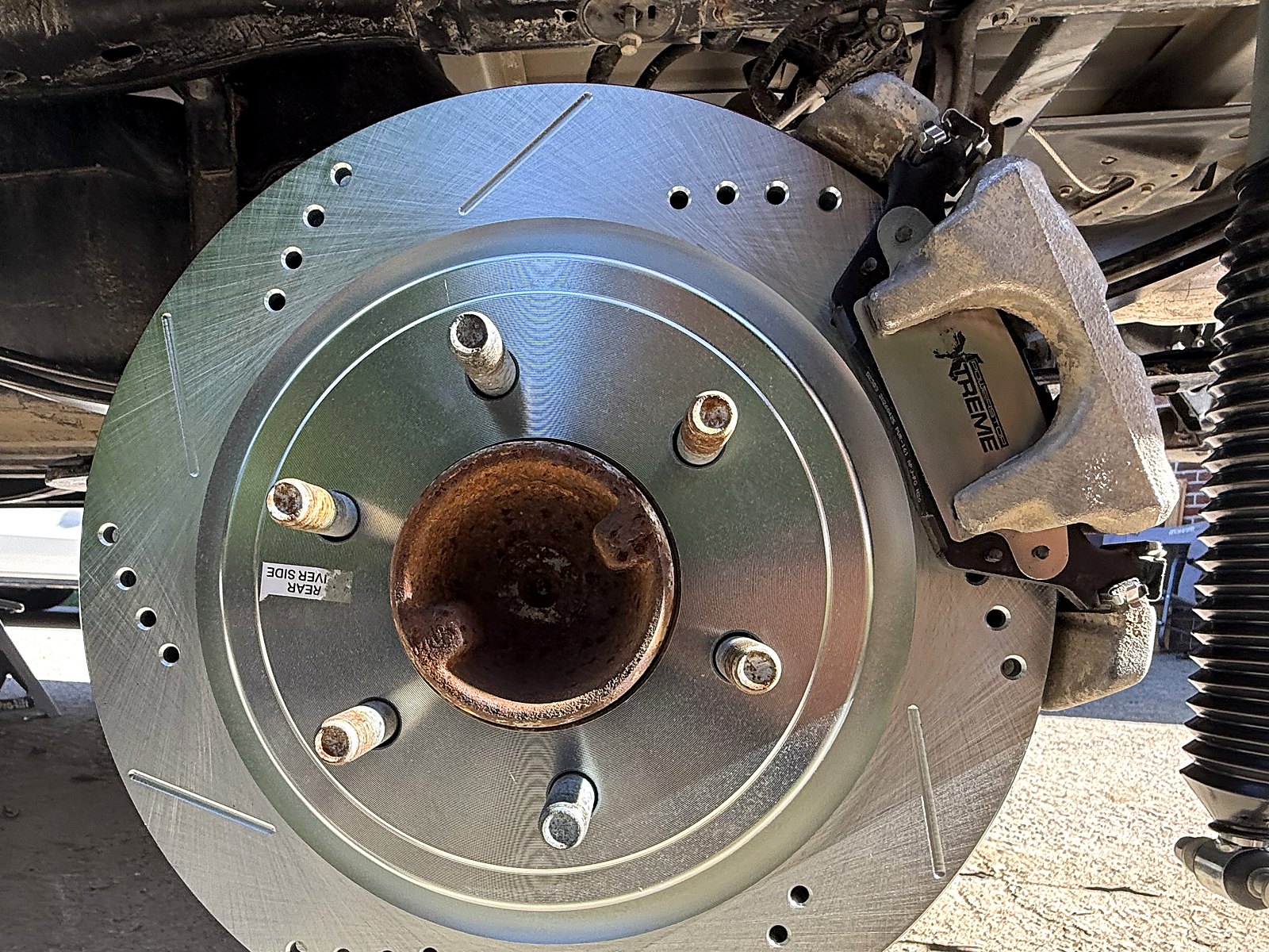 PowerStop Z36 Truck & Tow pad and rotor kit, front and rear — Rear rotor and caliper back on.