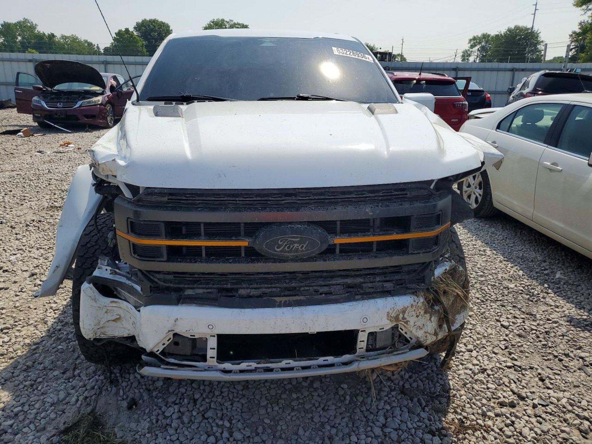 Front-end damage documented during intake